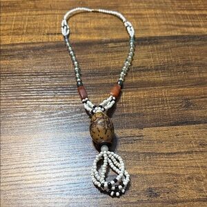 Elegant Beaded Necklace with Brown and White Accents